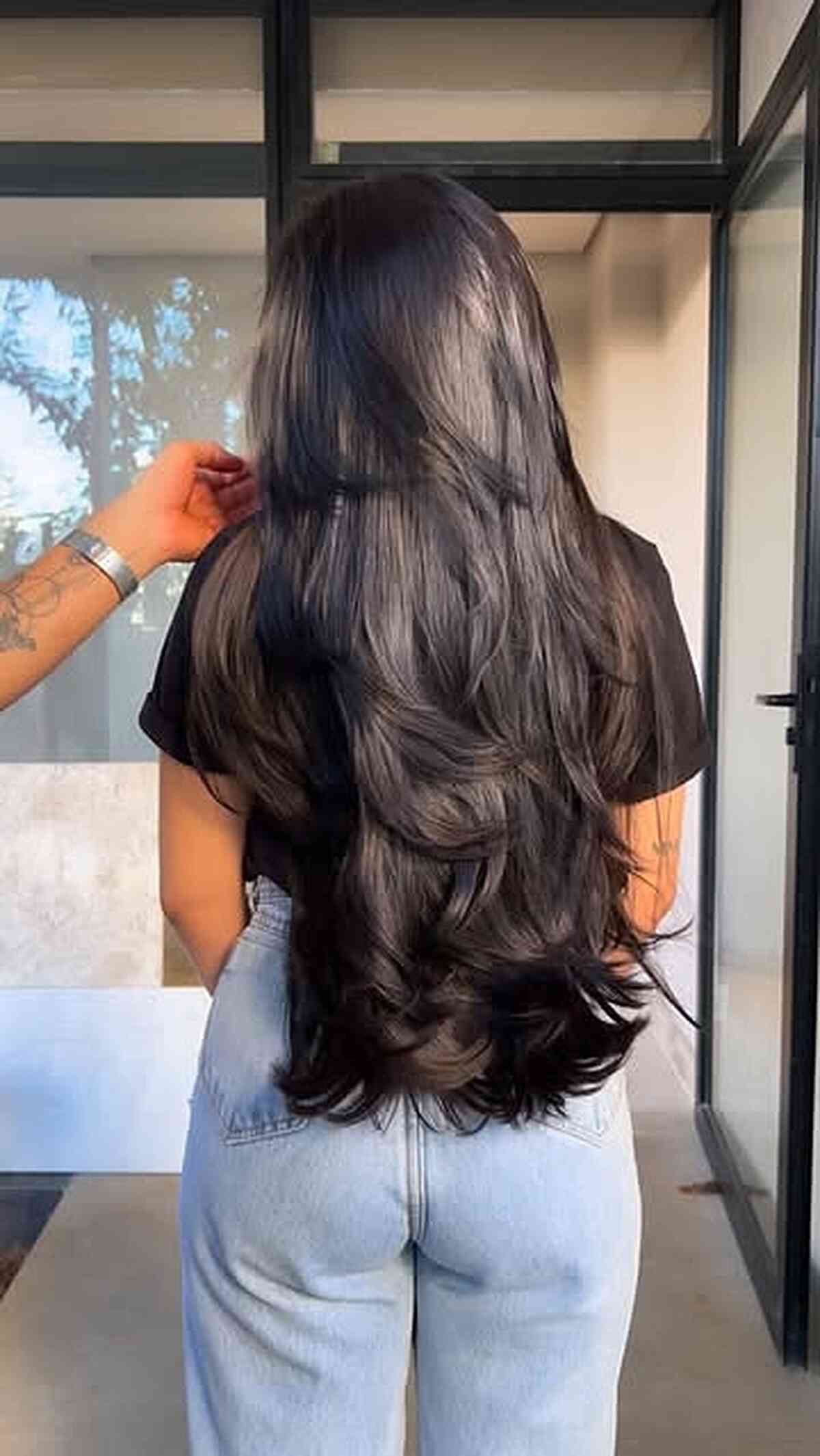 Flowy Long Layered Cut with Soft Waves