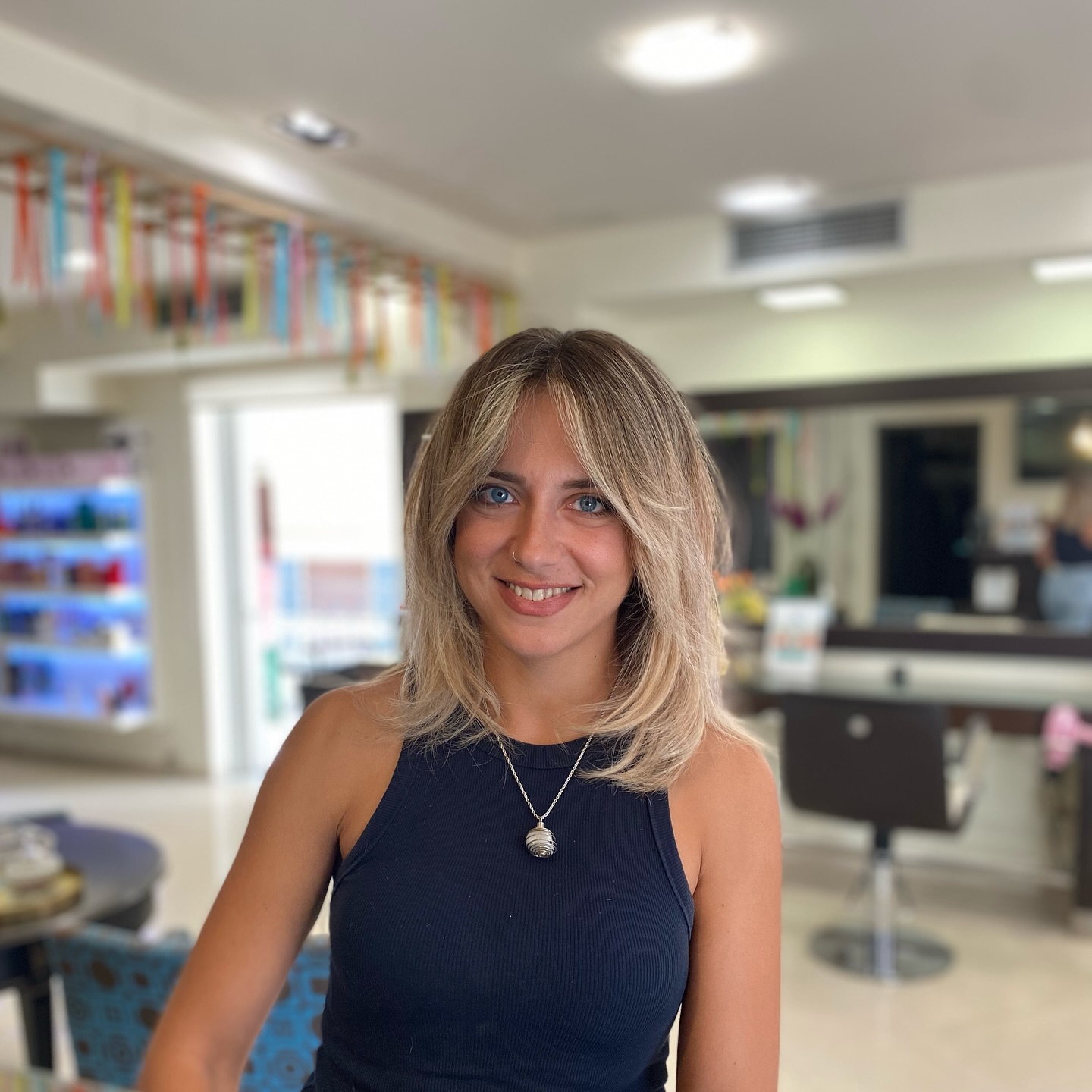 Light Ash Blonde Lob with Flowy Curtain Bangs