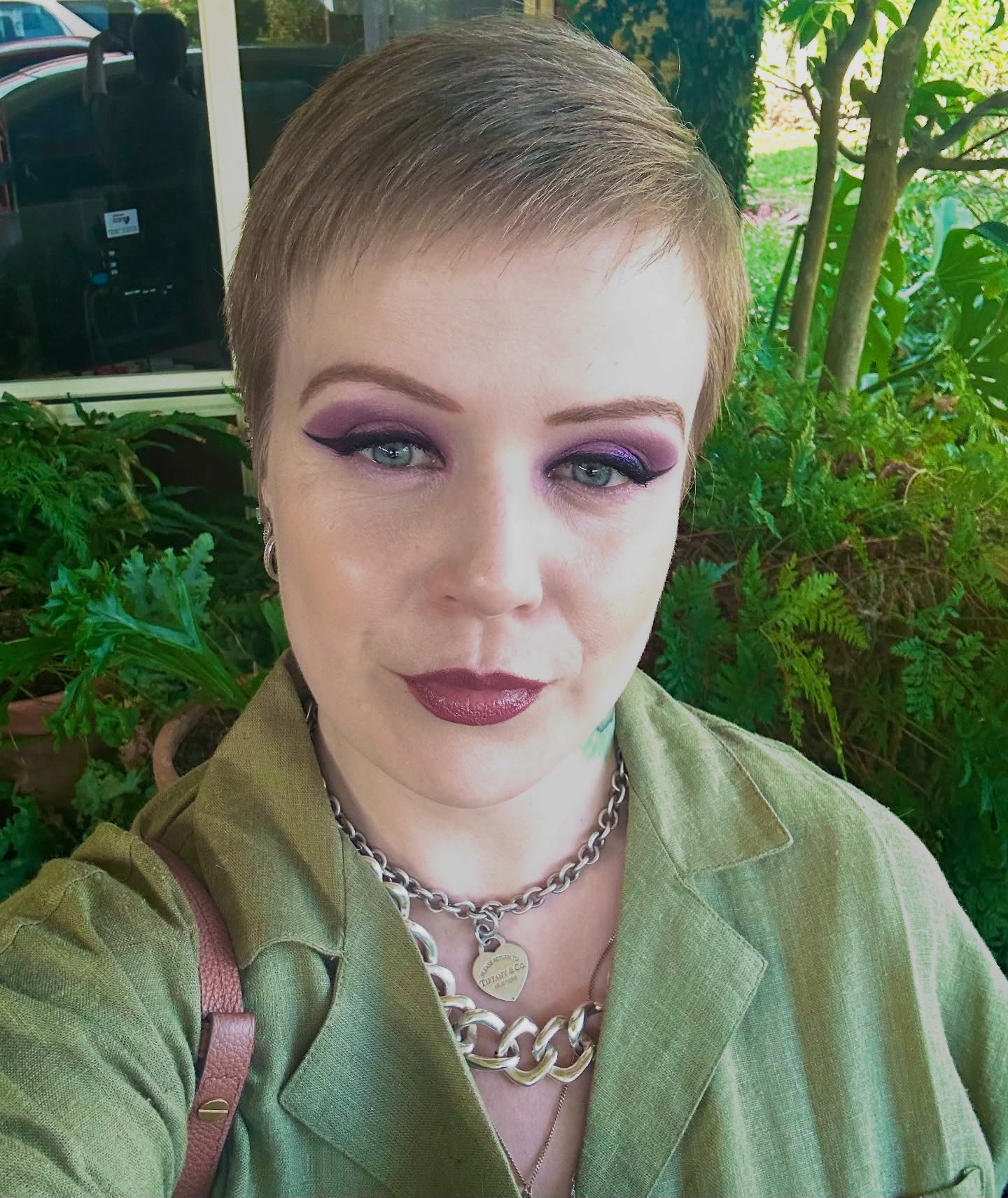 Sleek Ash Blonde Pixie with Subtle Taper