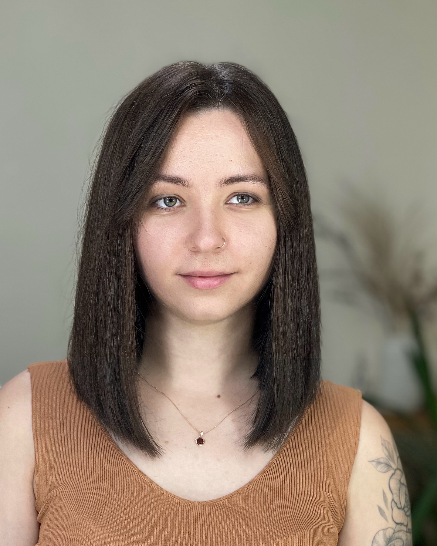 Sleek Chestnut Lob with Precise Curtain Bangs