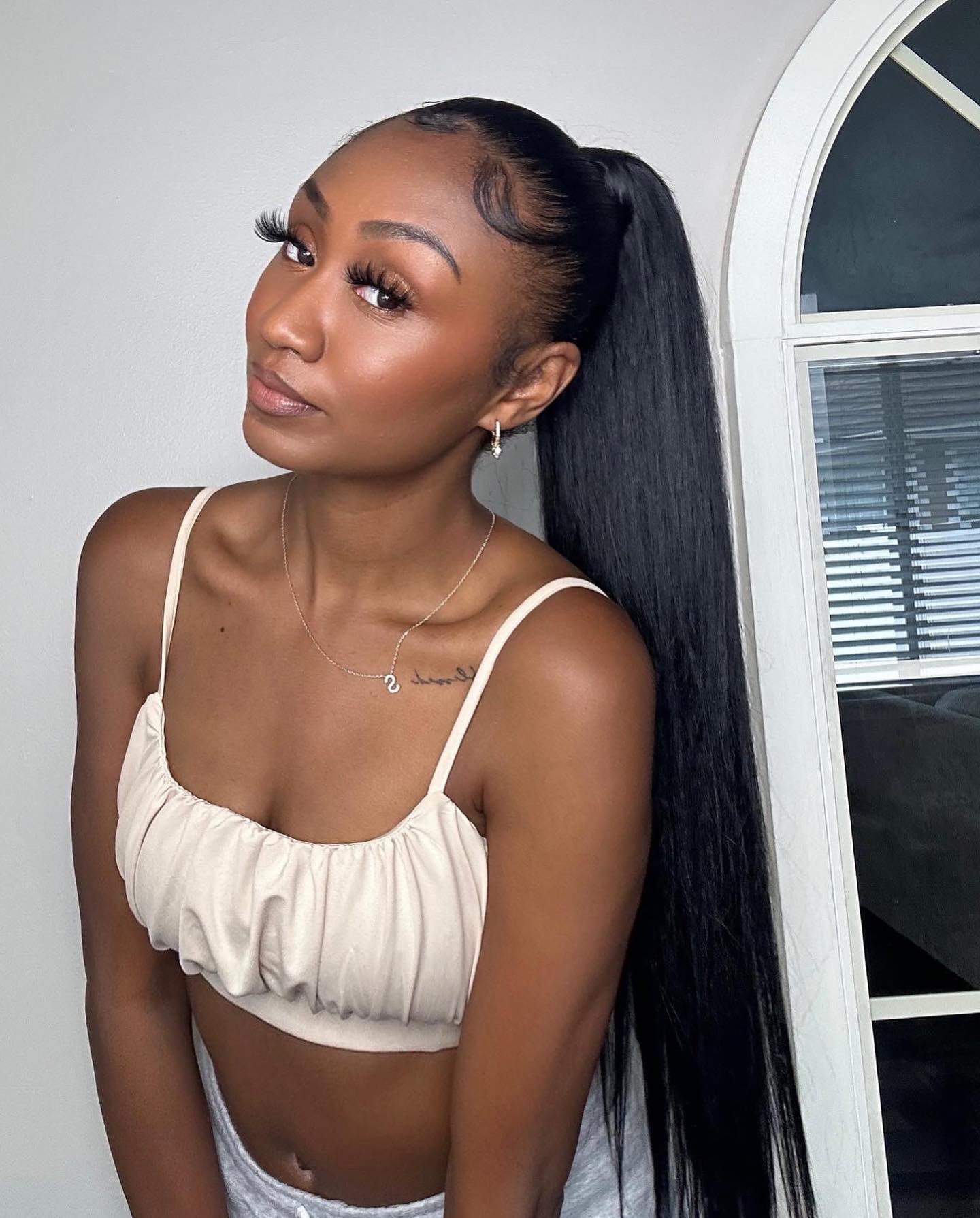 Sleek High Ponytail with Subtle Baby Hairs