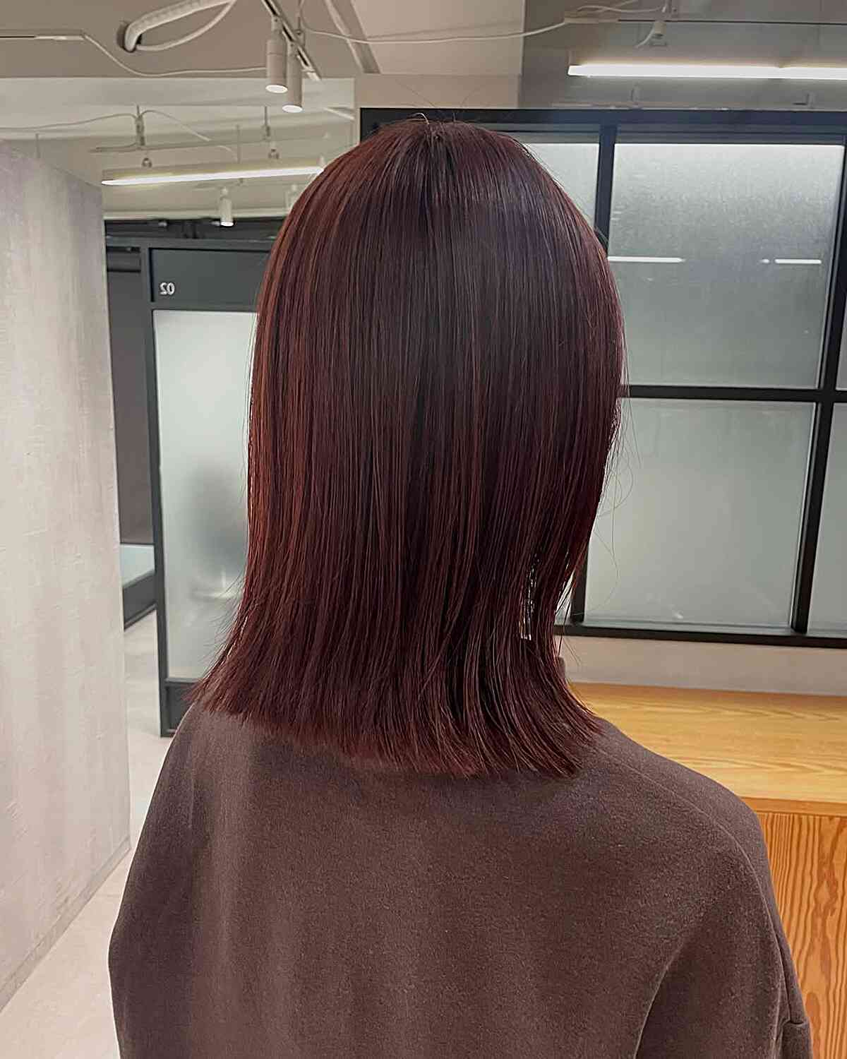 Sleek Medium-Length Straight Cut with Subtle Layers