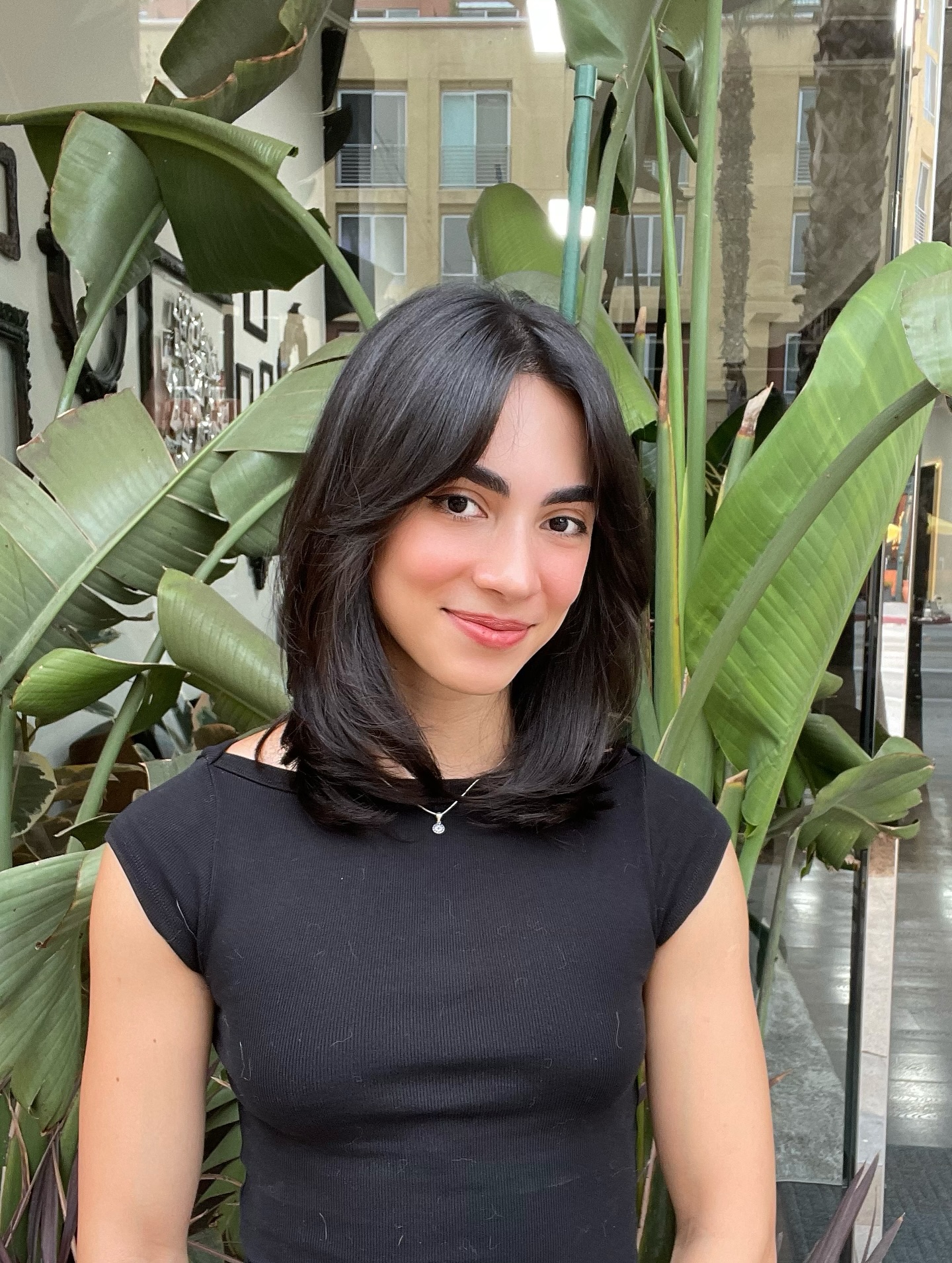 Sleek Onyx Lob with Delicate Curtain Bangs