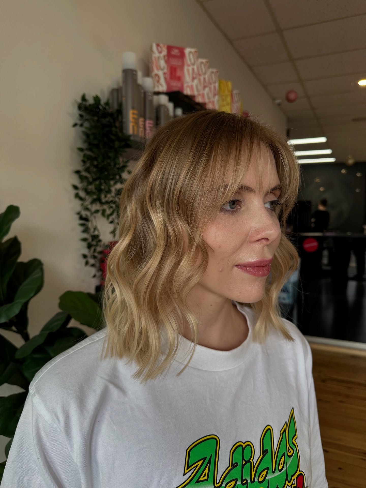 Beachy Blonde Waves with Feathered Wispy Bangs