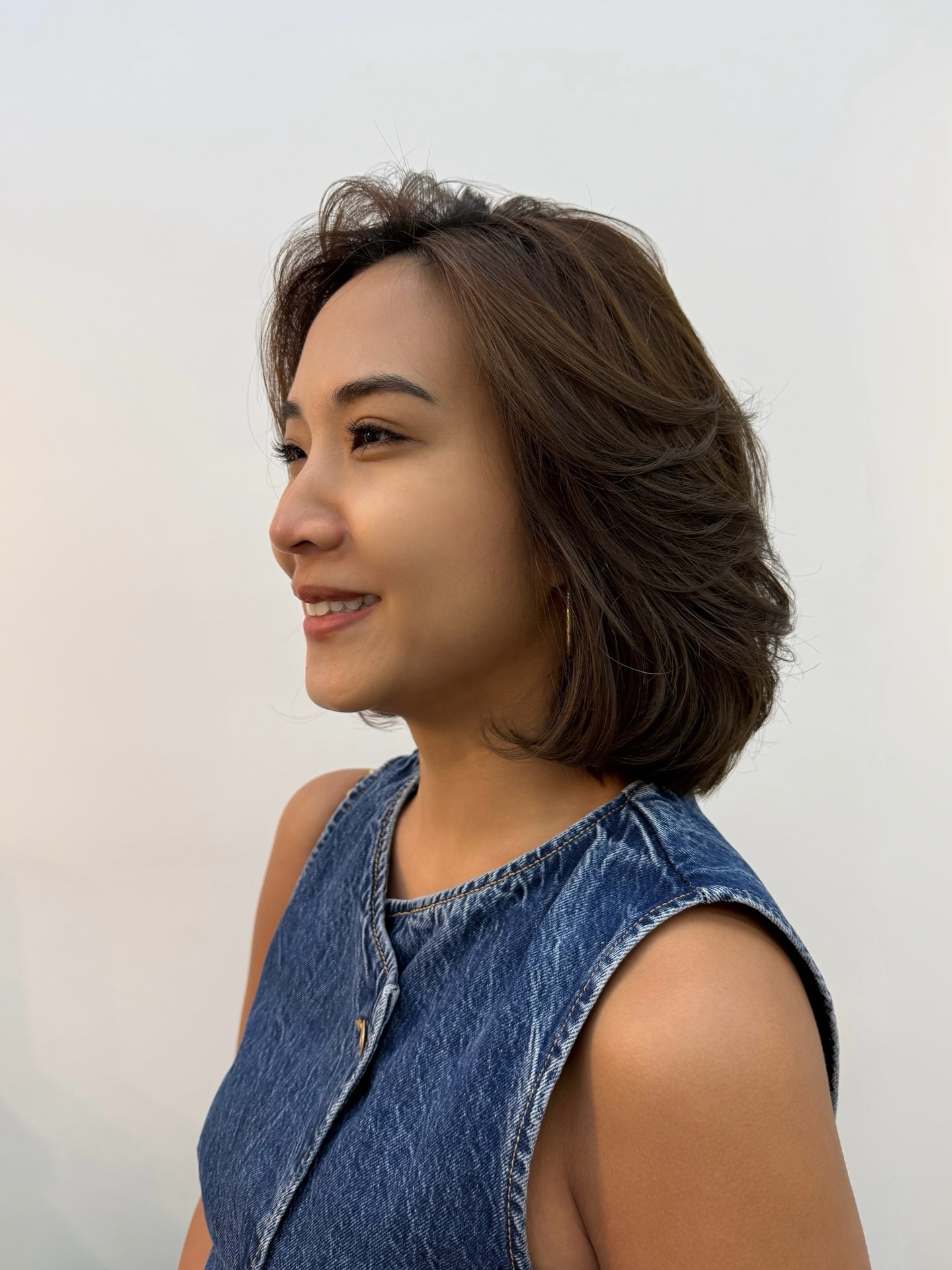 Brunette Swooping Layers with Soft Curls