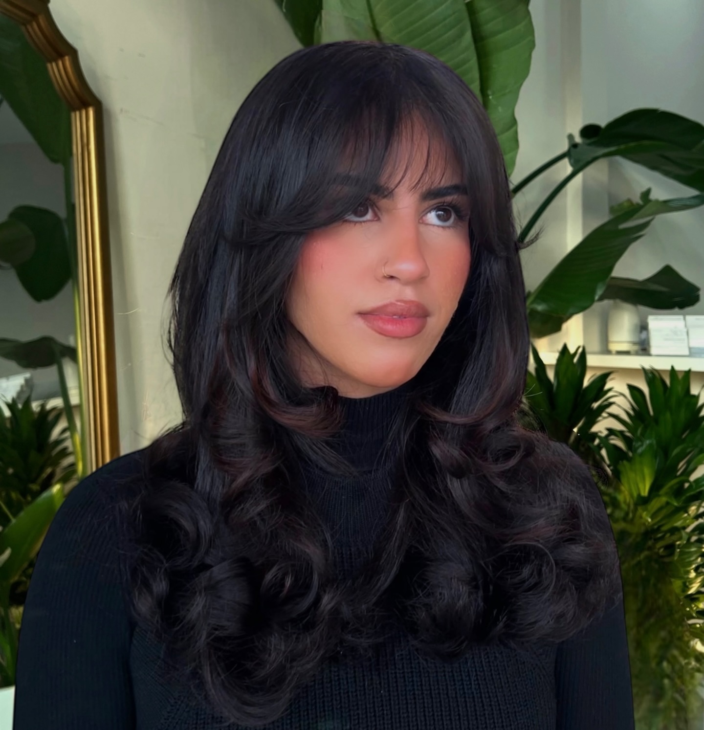 Elegant Ebony Curls with Subtle Wispy Bangs