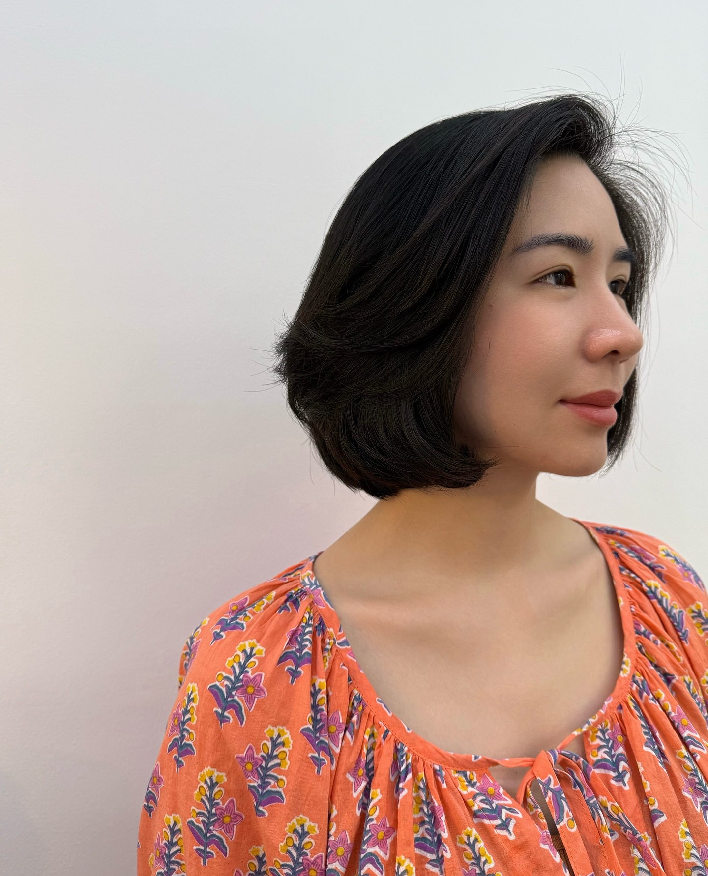 Flowing Tapered Bob with Natural Highlights