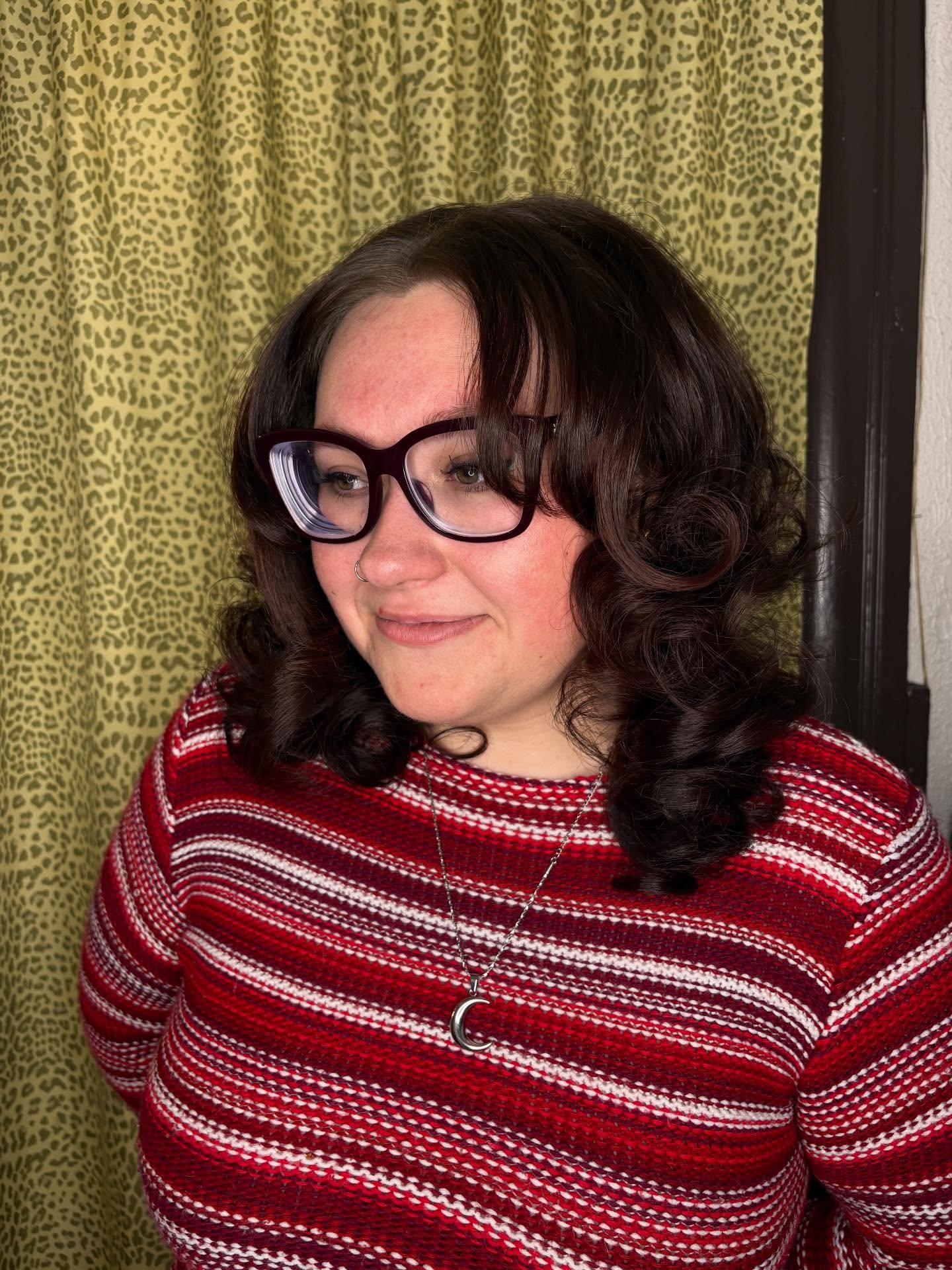 Glossy Midnight Curls with Precision Bob Cut