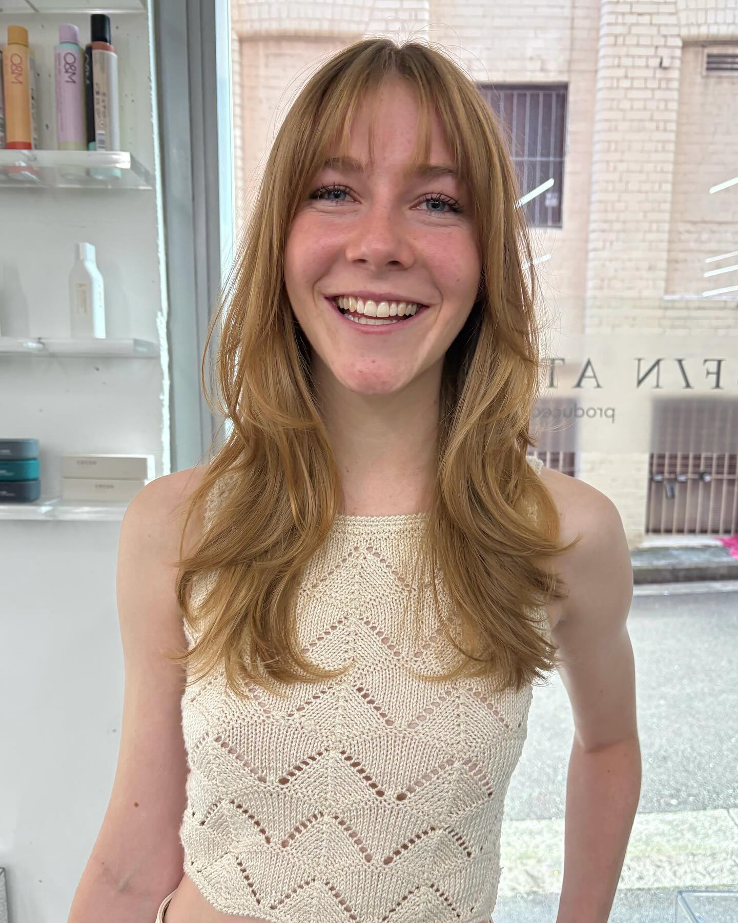Soft Sunlit Layers with Feathered Bangs