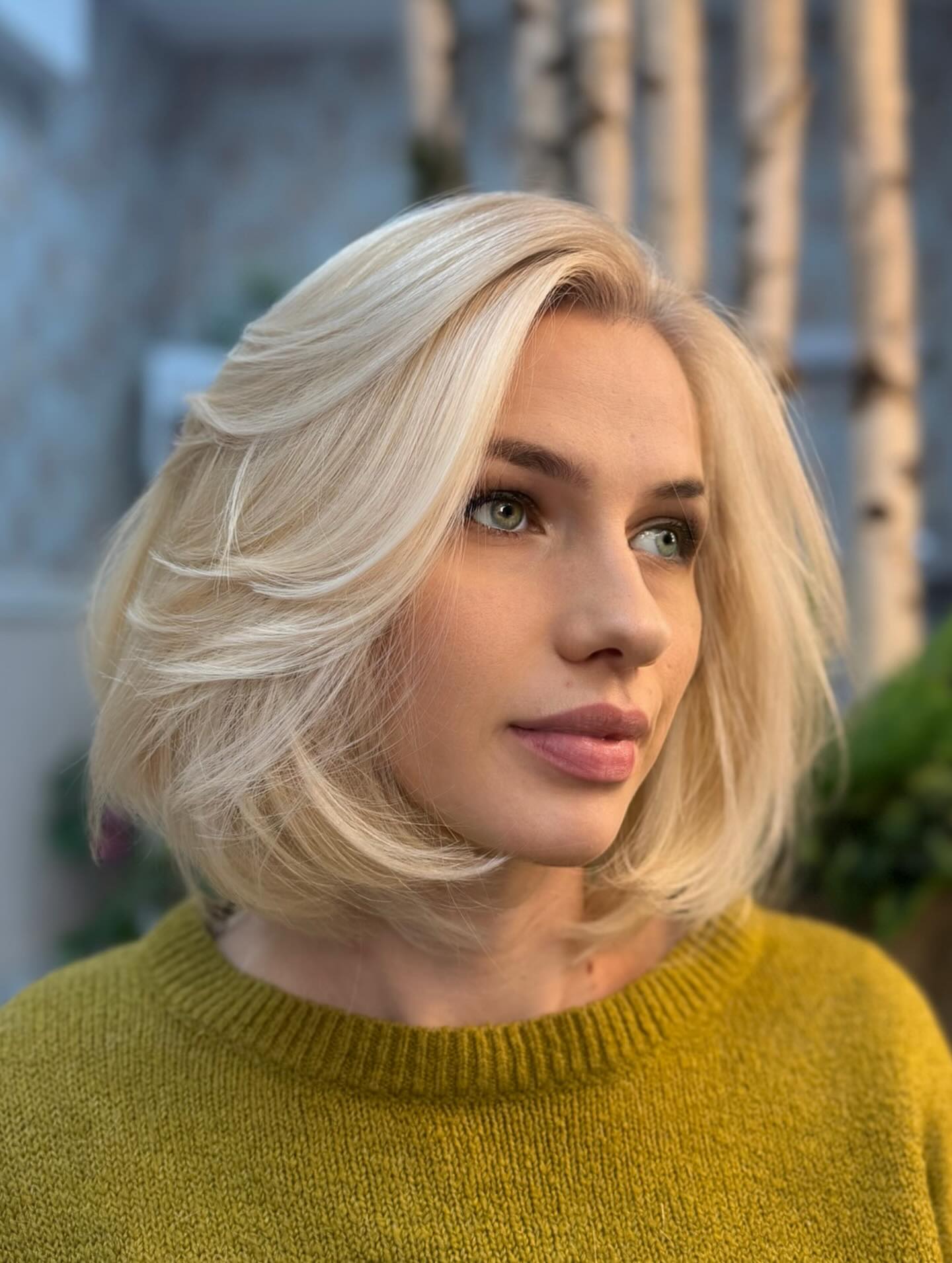 Softly Textured Light Blonde Bob with Face-Framing Layers