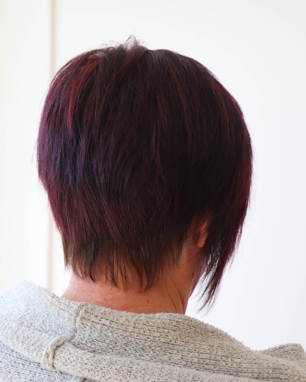 Bold Stacked Bob with Vibrant Red Highlights