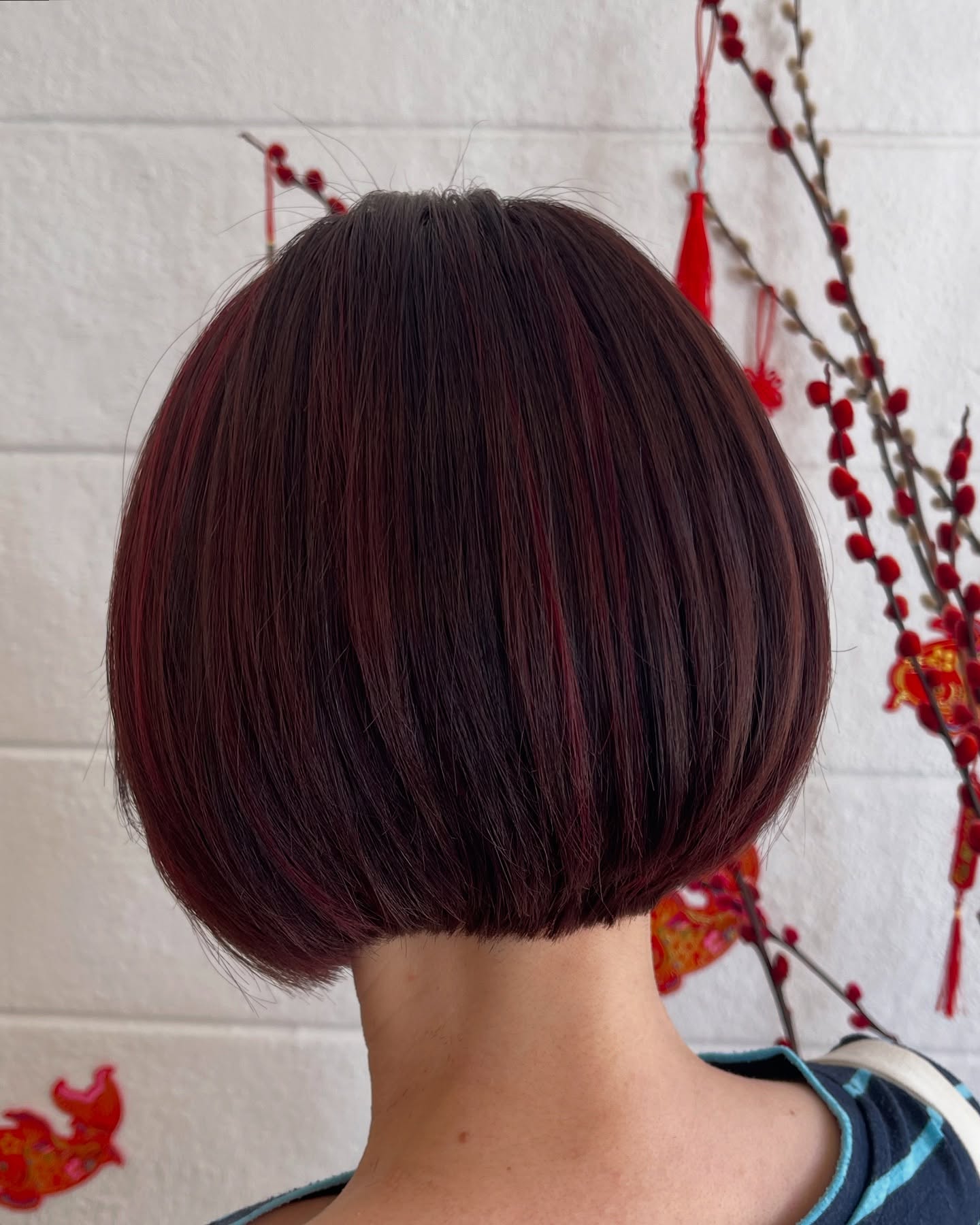 Chic Inverted Bob with Bold Red Highlights