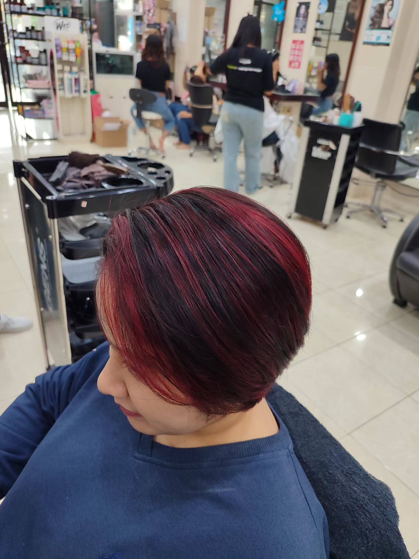 Chic Short Bob with Bold Red Highlights