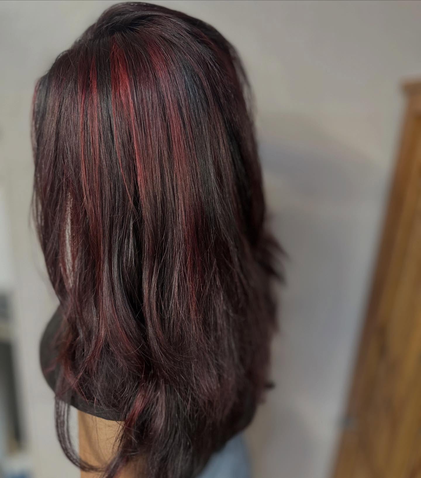 Elegant Choppy Layers with Bold Red Highlights