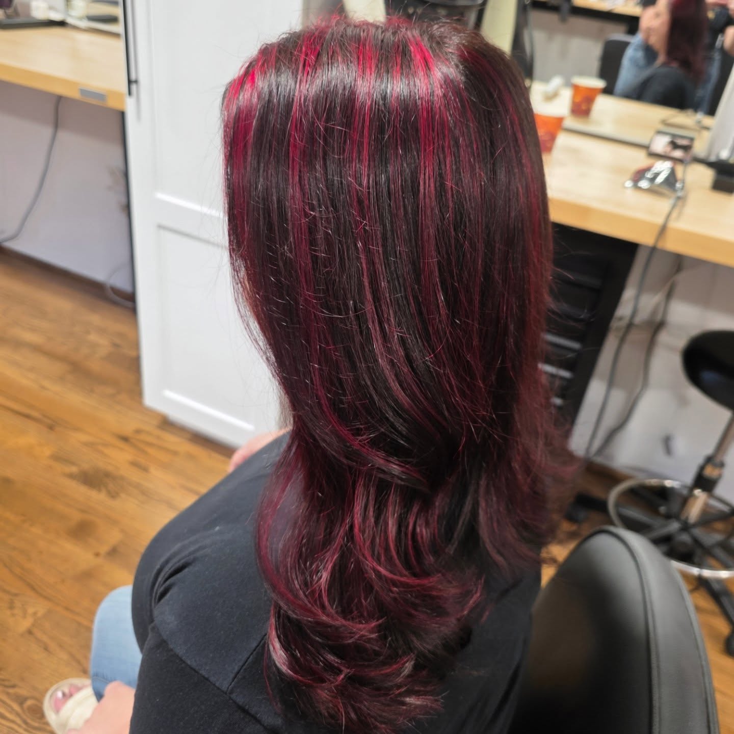 Modern Layered Cut with Bold Red Highlights