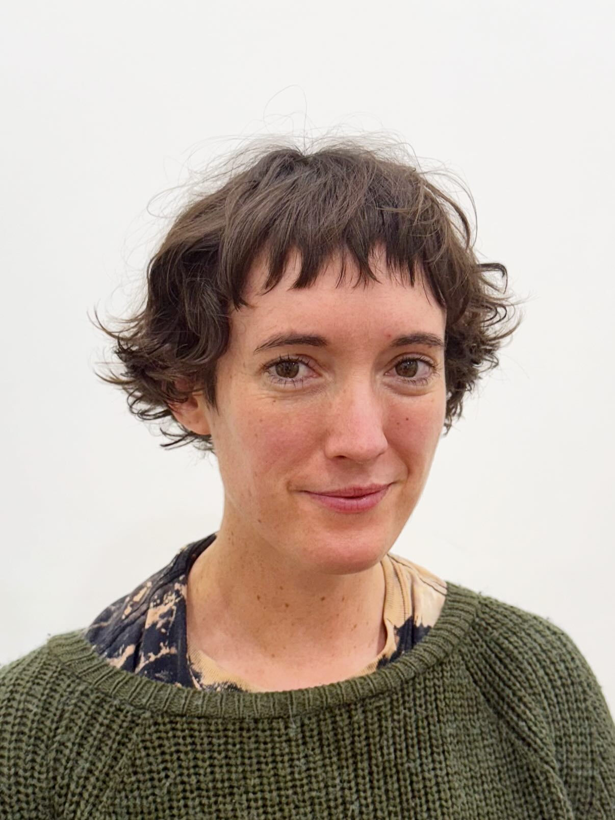 Playful Natural Toned Wavy Pixie