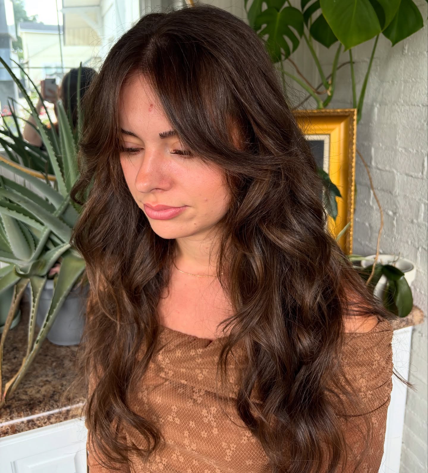 Radiant Dark Chocolate Waves with Soft Curtain Bangs