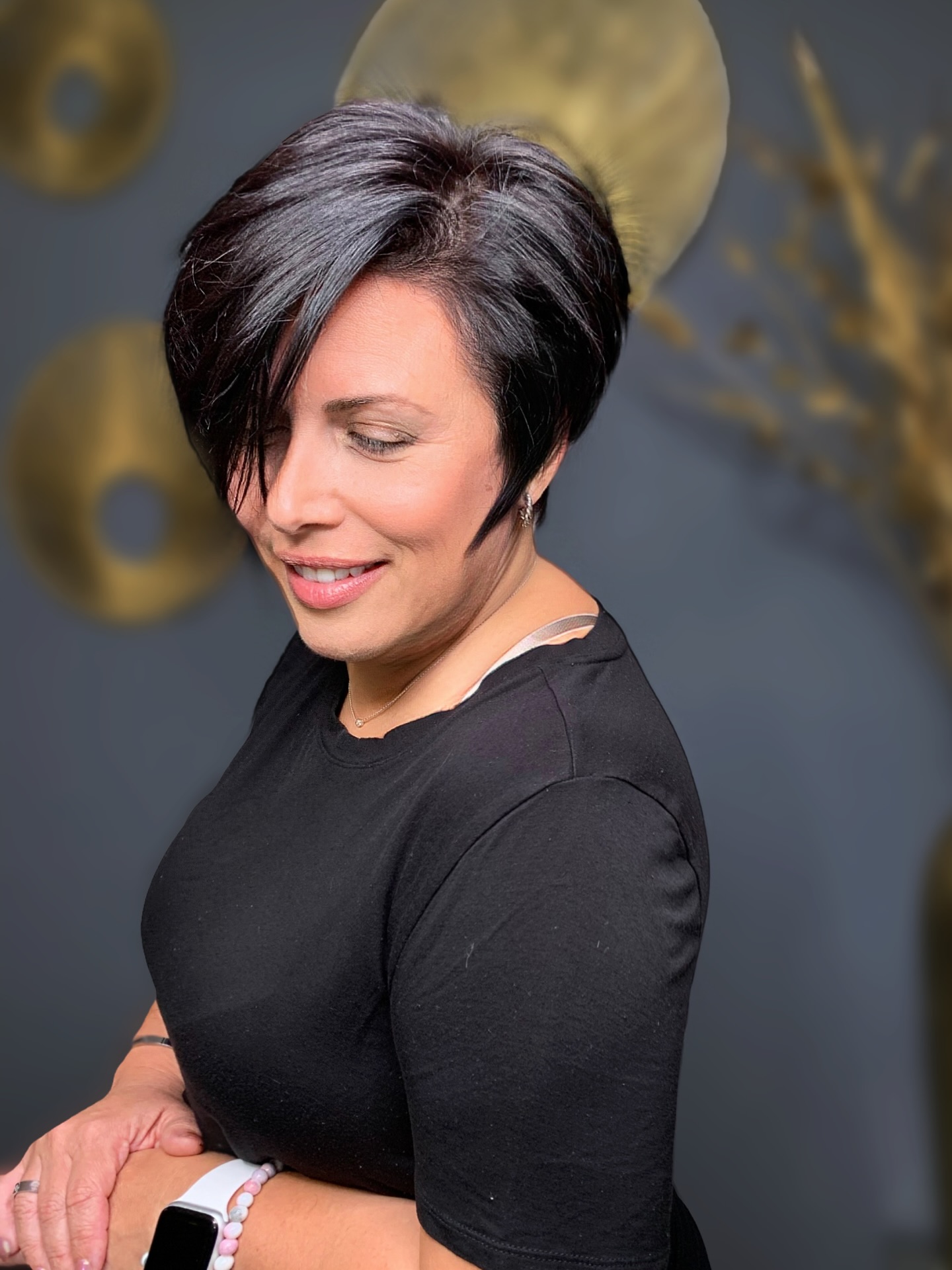 Sleek Asymmetrical Black Pixie with Voluminous Back