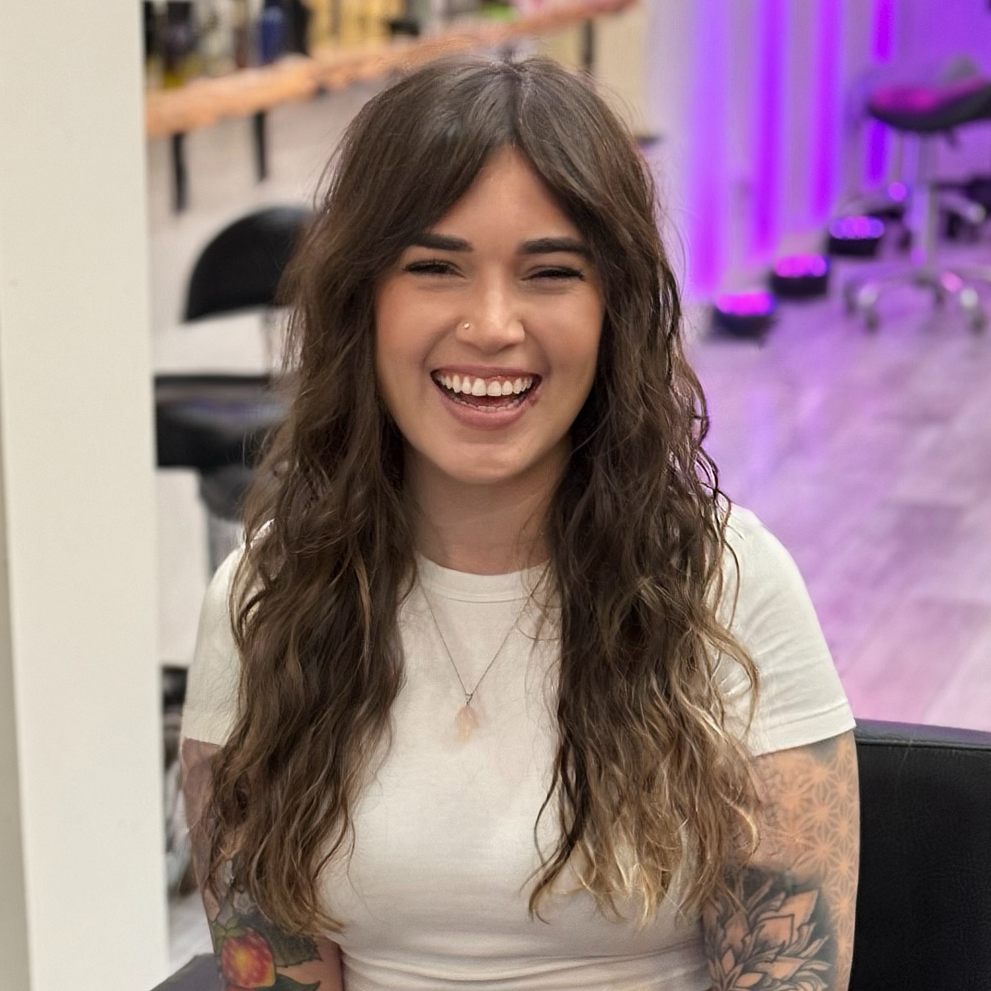Soft Brunette Waves with Voluminous Curtain Bangs