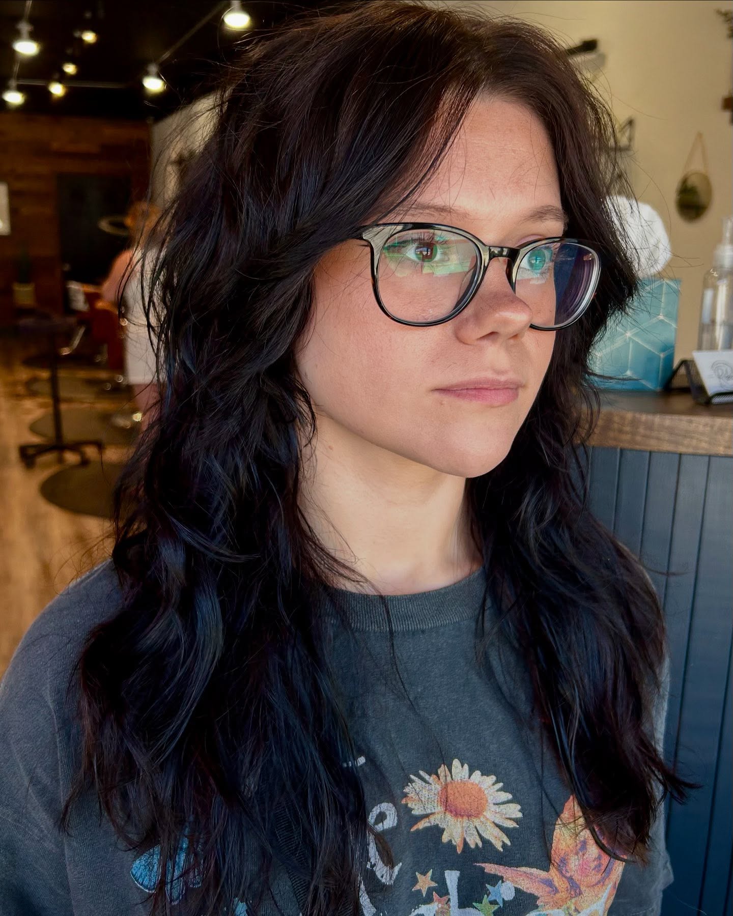 Strikingly Natural Curls with Deep Textured Bangs