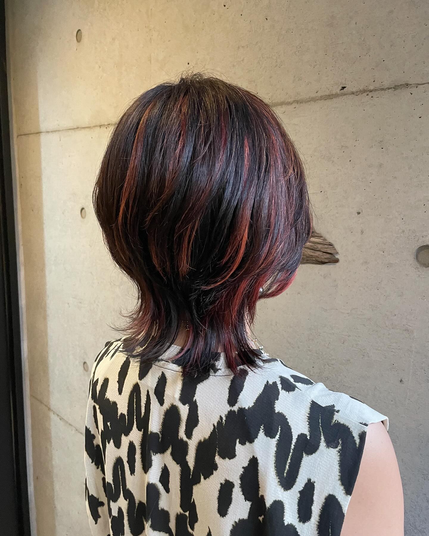 Textured Bob with Fiery Red Highlights