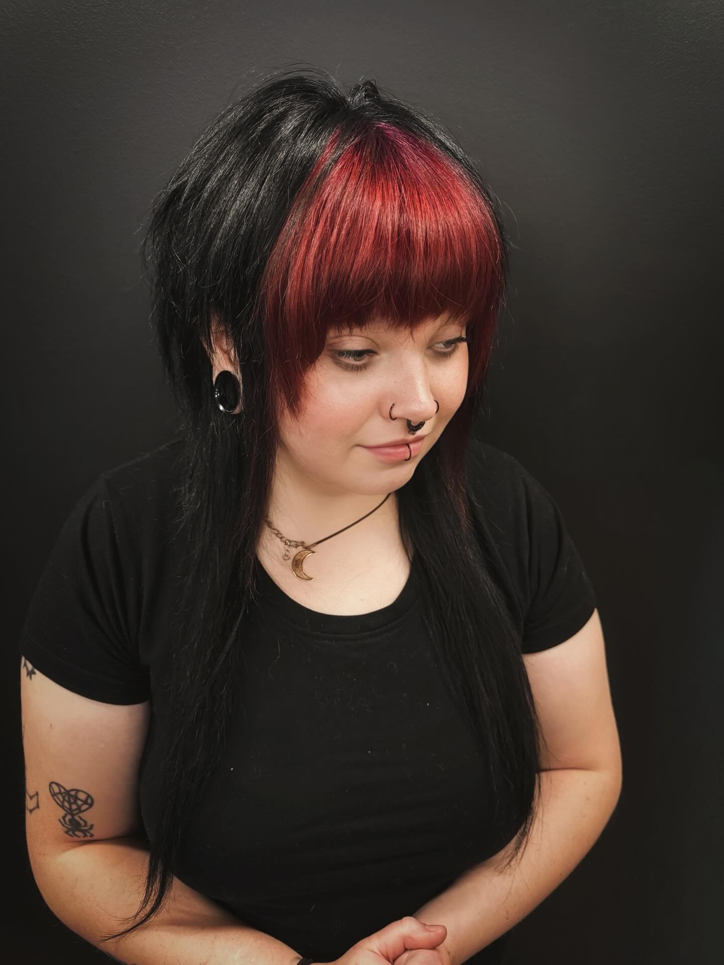 Fiery Crimson Spotlight on Glossy Black Layers