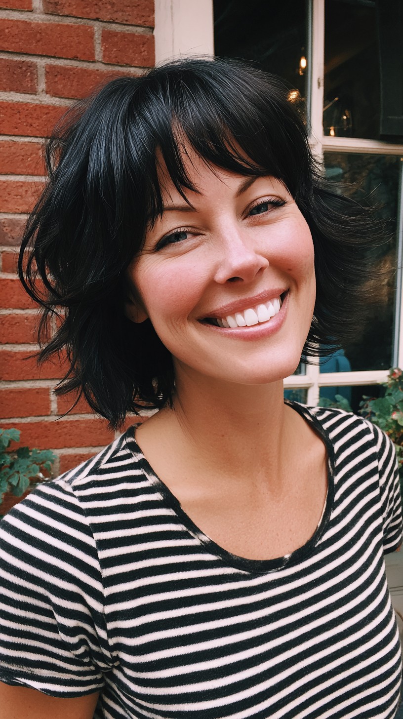 Jet-Black Wavy Bob with Curtain Bangs