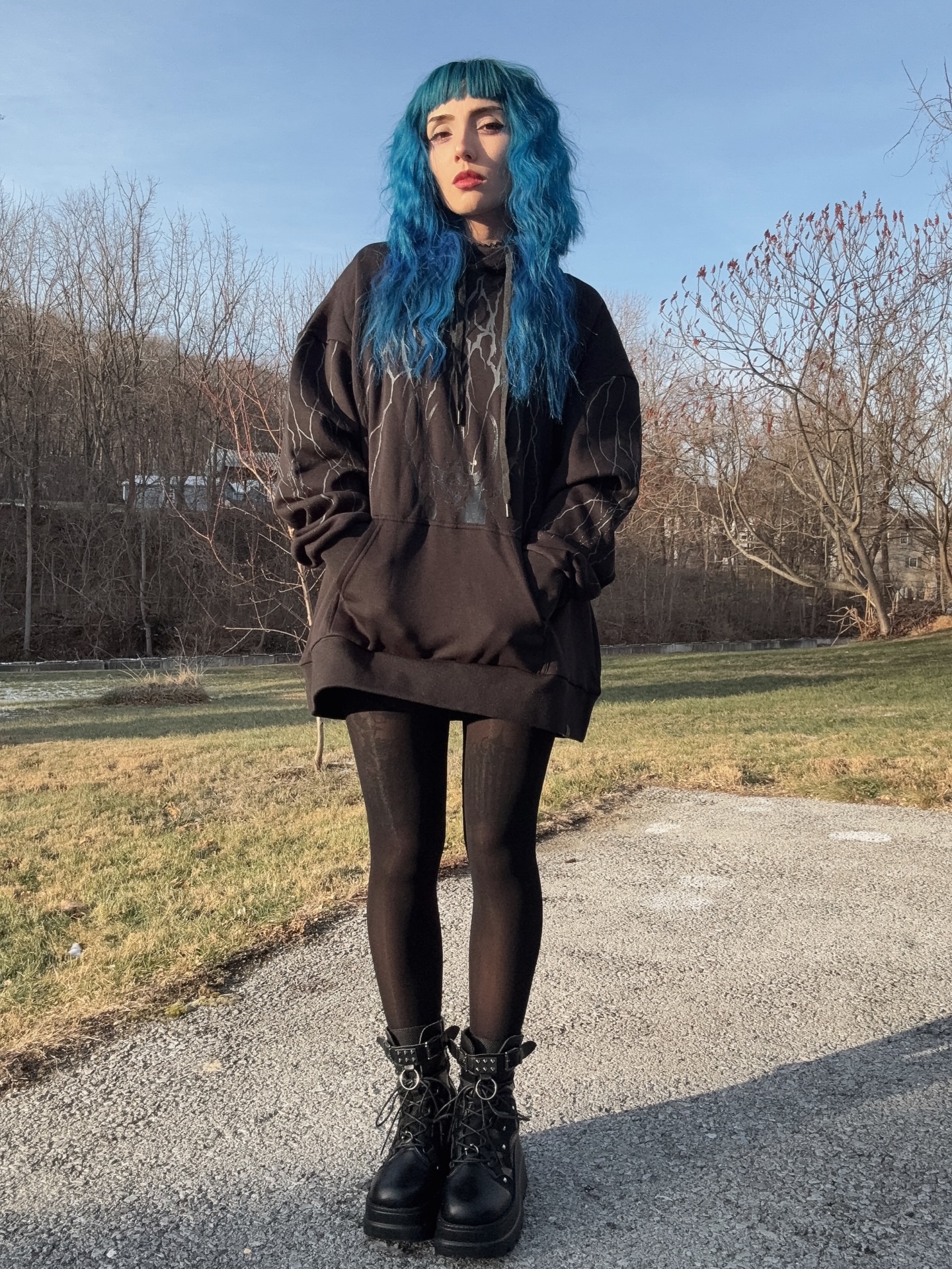 Vibrant Aqua Waves with Gothic Undertones