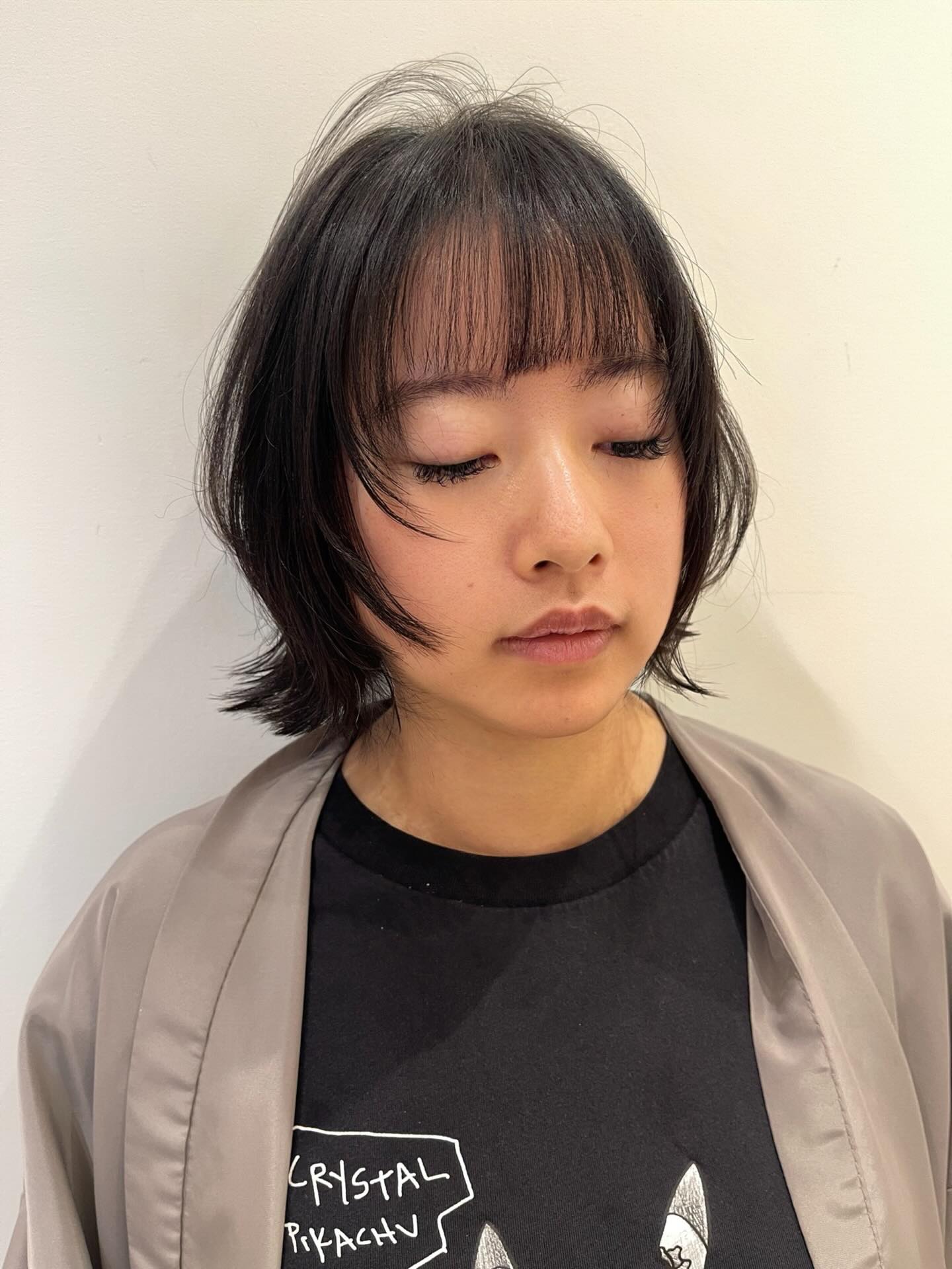 Chic Textured Bob with Soft Wispy Bangs