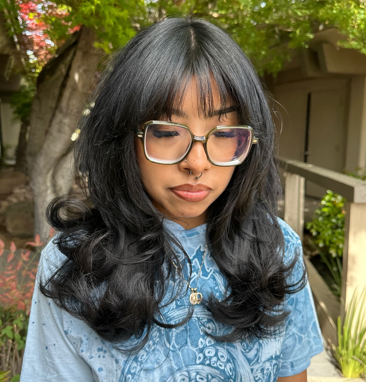 Dark Layered Waves with Soft Wispy Bangs