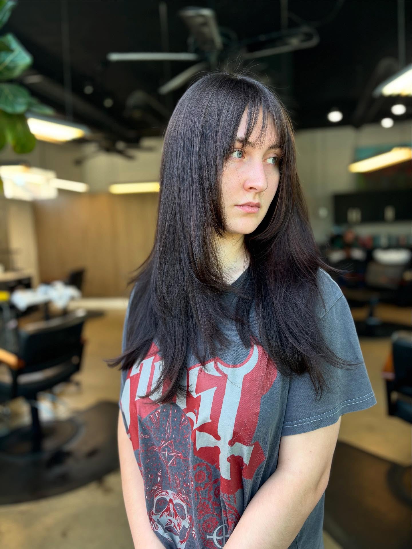 Sleek Layered Cut with Soft 90s-Inspired Bangs