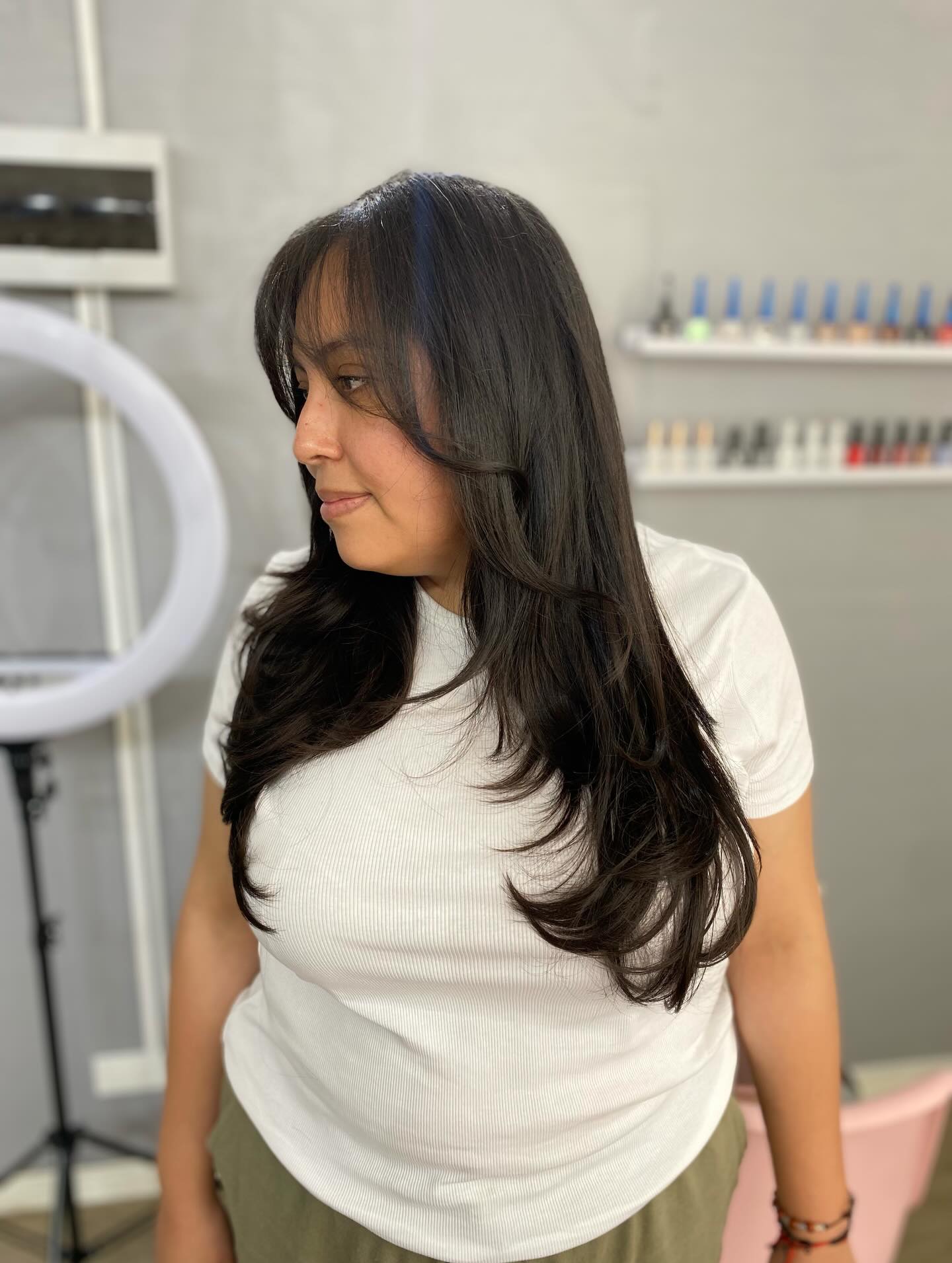 Sleek Long Layers with Soft 90s Wispy Bangs