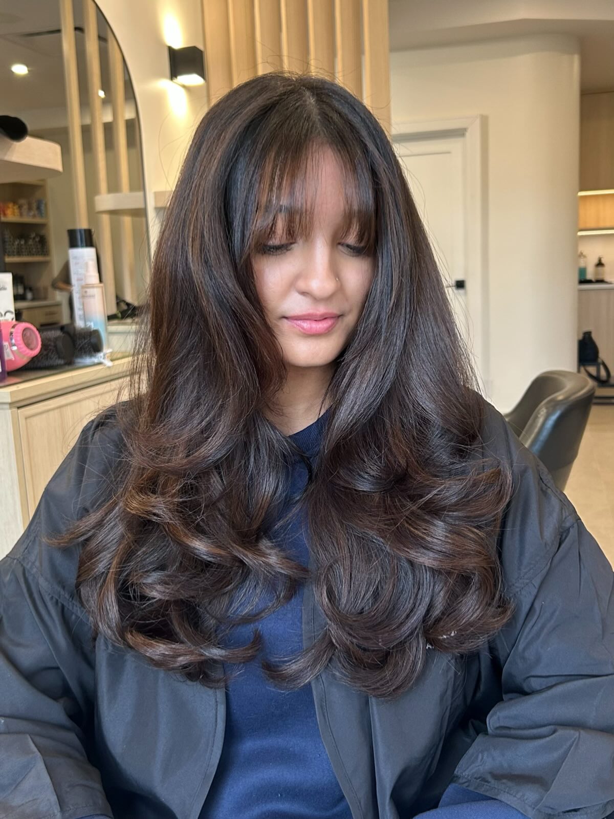 Soft Wispy Bangs with Luxurious Layered Waves