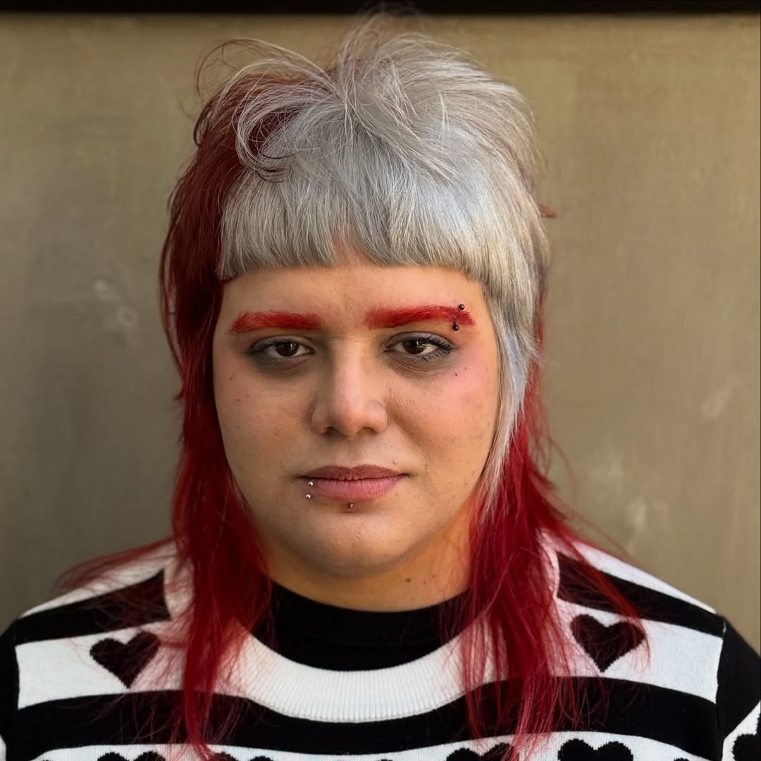 Bold Two-Tone Red and Silver Shag with Voluminous Bangs