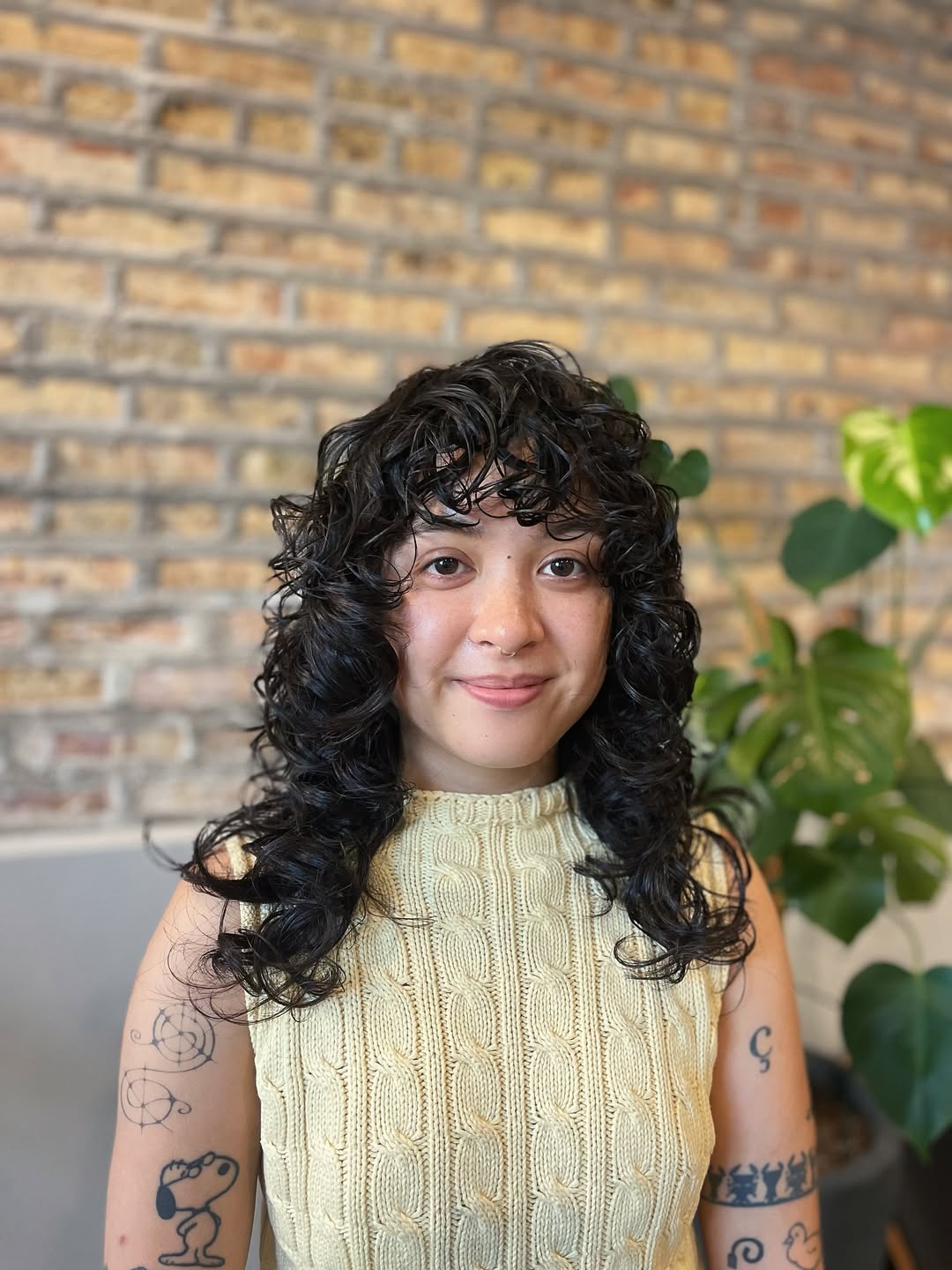 Bouncy Natural Curls with Luminous Black Tones
