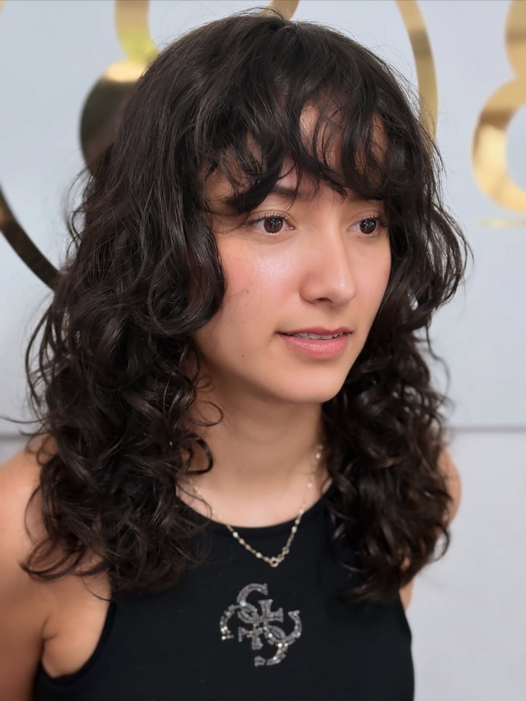 Effortless Brunette Waves with Soft Bangs