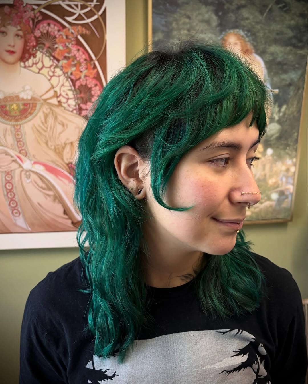 Emerald-Tinted Wavy Bob with Side-Swept Bangs
