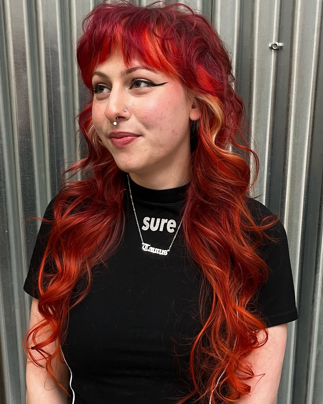 Fiery Auburn Cascading Curls with Bold Fringe