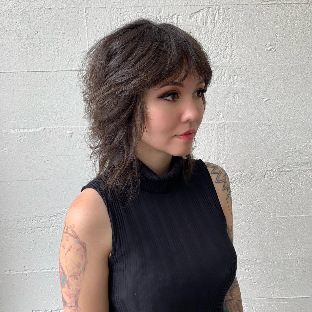 Mesmerizing Charcoal Tousled Shag with Side-Swept Bangs