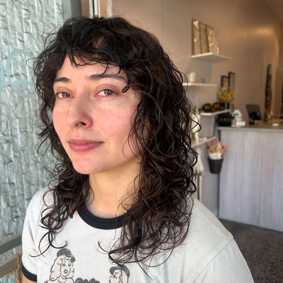 Natural Brunette Curls with Layered Bangs