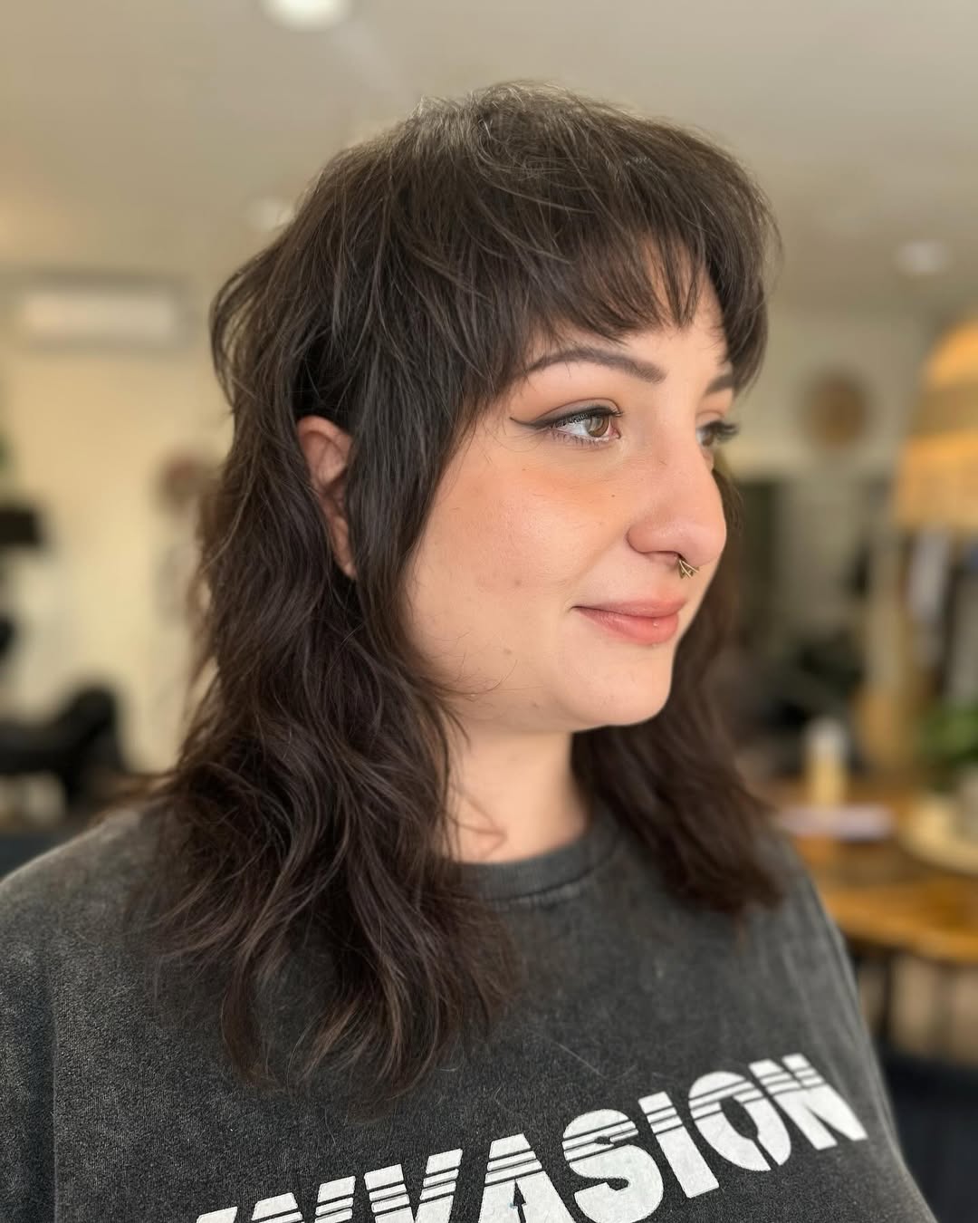 Softly Tapered Chestnut Waves with Feathered Bangs