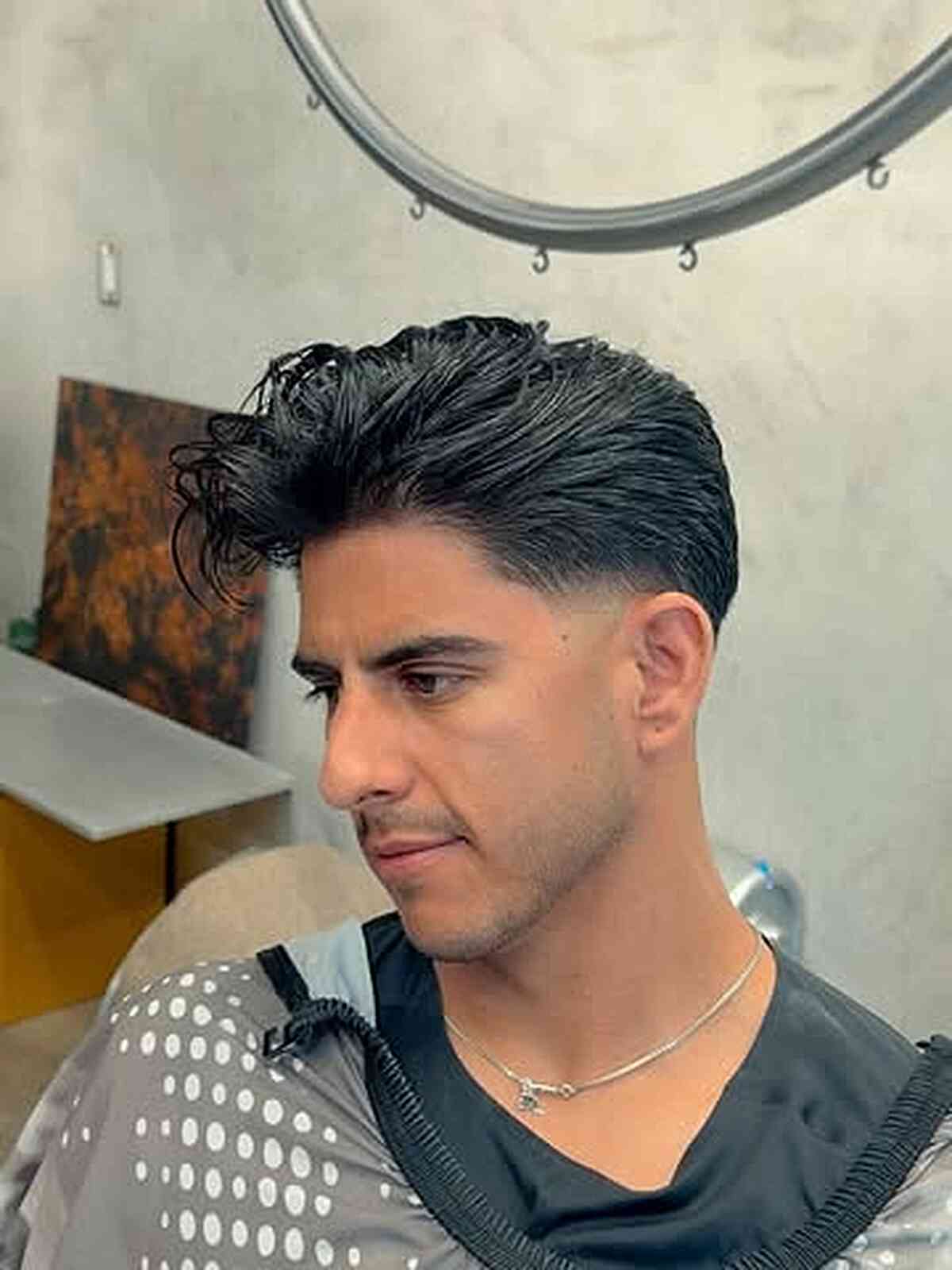Stylish Mini Pompadour with Tapered Sides