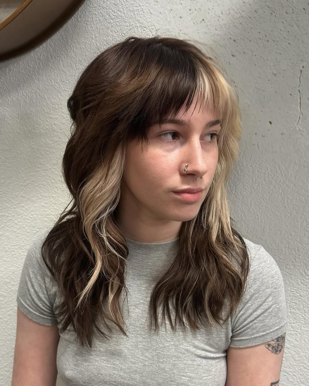 Subtle Blonde Balayage with Fringed Bangs