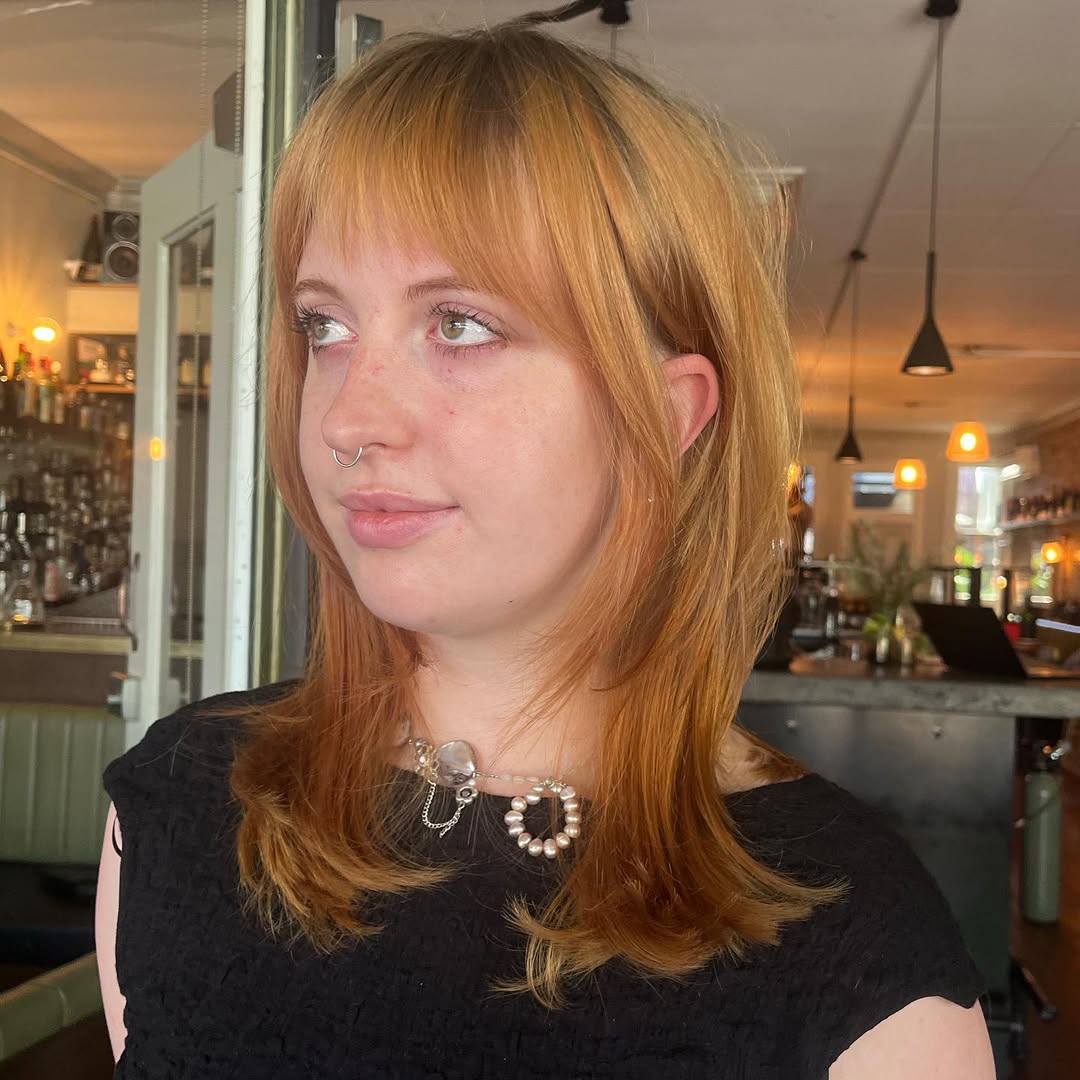 Subtle Ginger Layers with Soft Fringe