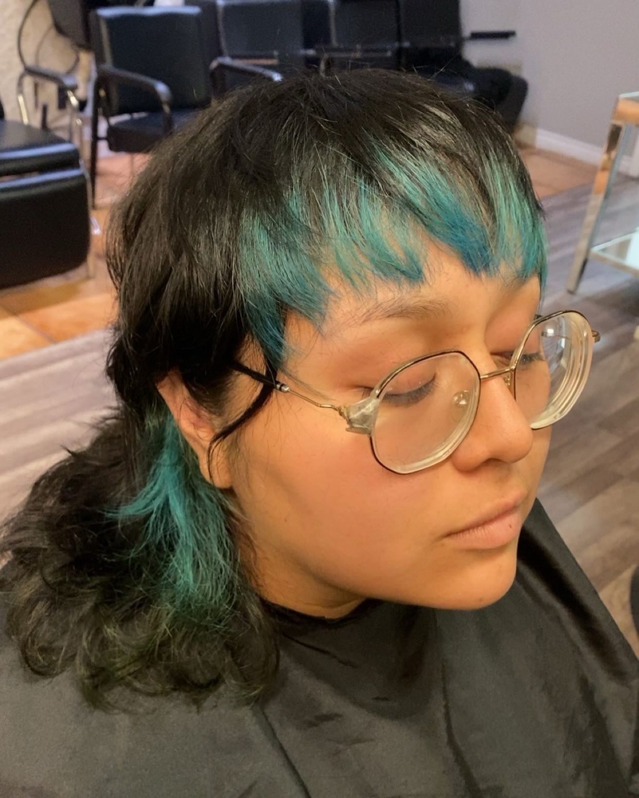 Teal-Tipped Textured Layers with Bangs