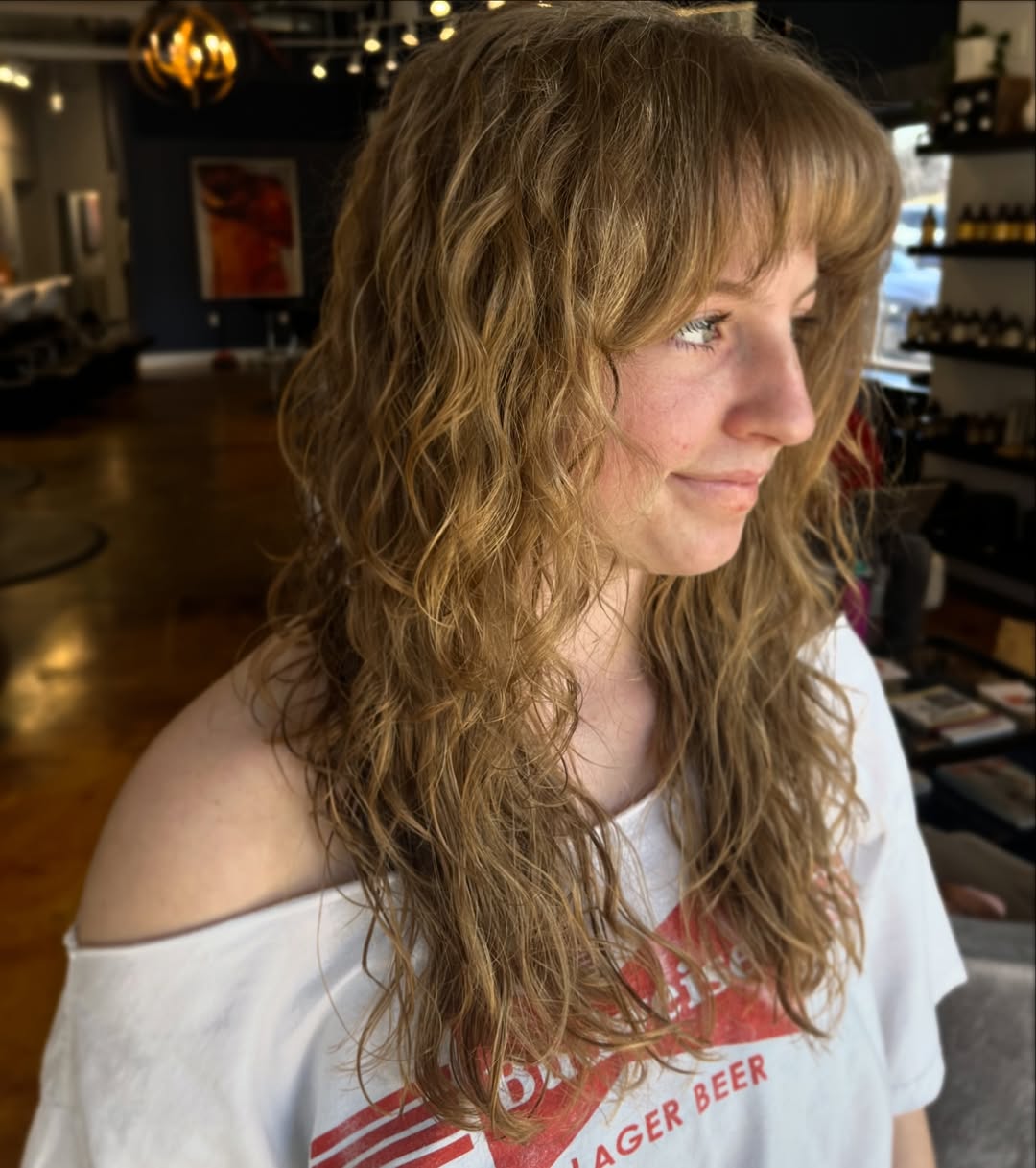 Textured Strawberry Blonde Waves with Soft Fringe