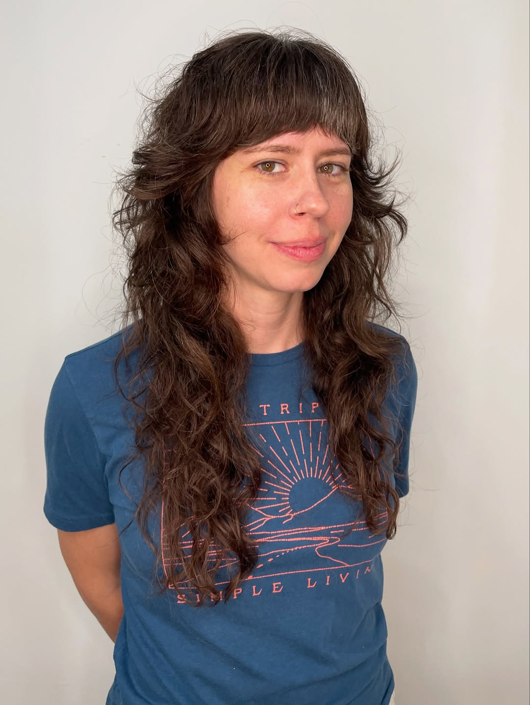 Whimsical Brown Waves with Bangs