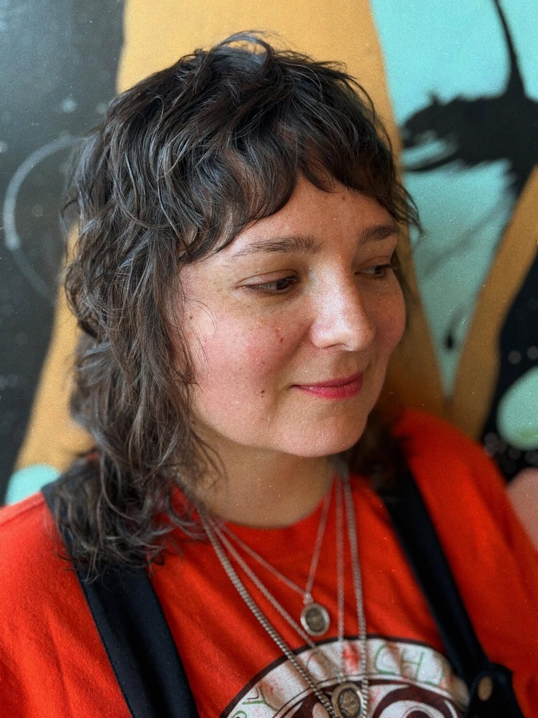 Whimsical Dark Waves with Swooped Bangs