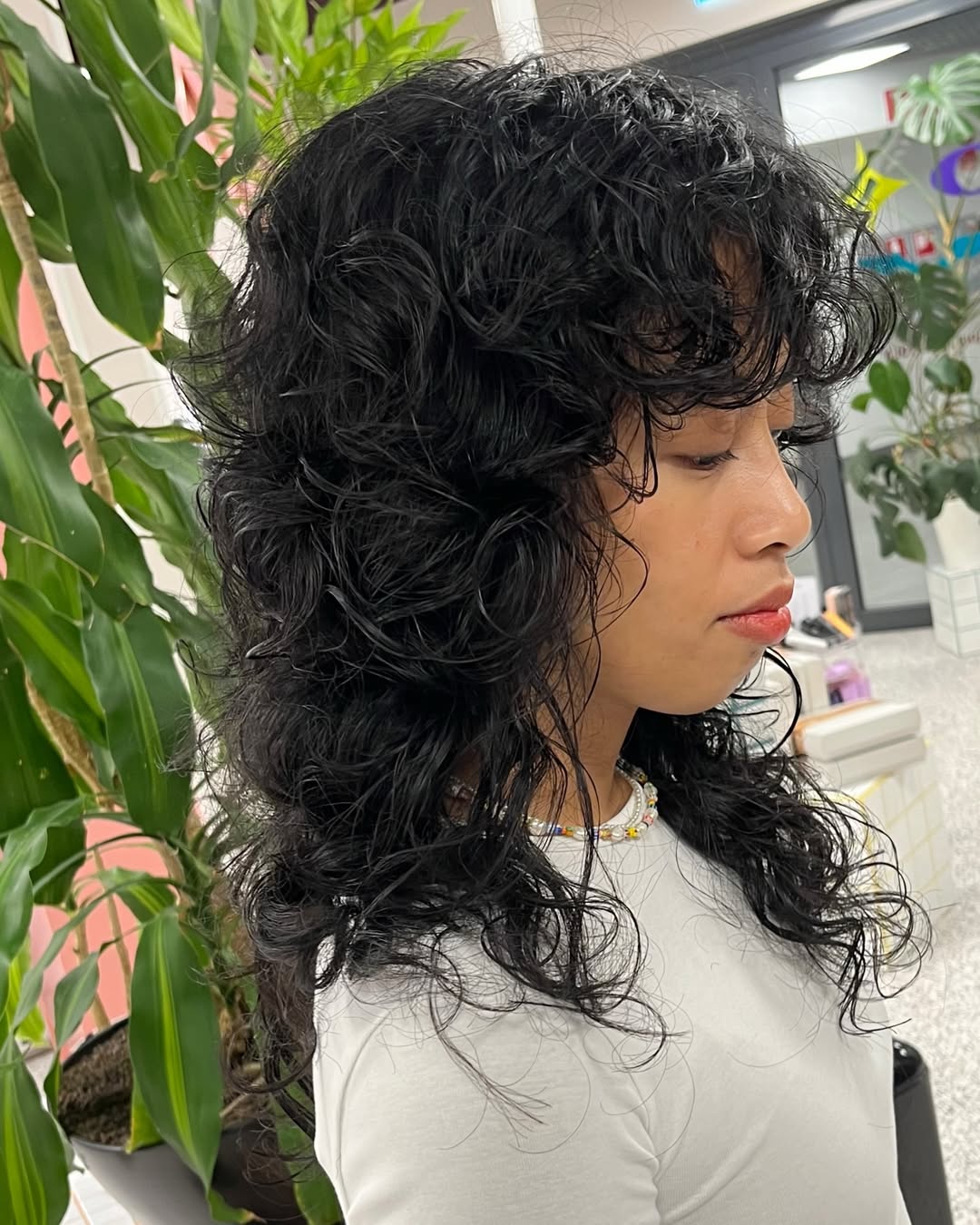 Whirlwind Curly Wolf Cut with Natural Elegance