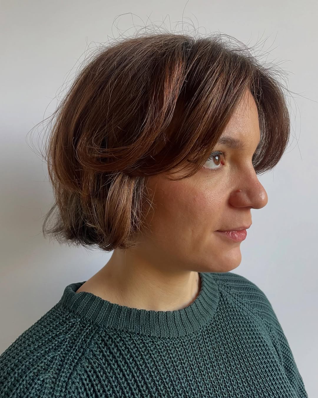 Auburn Tousled Bob with Side-Swept Bangs